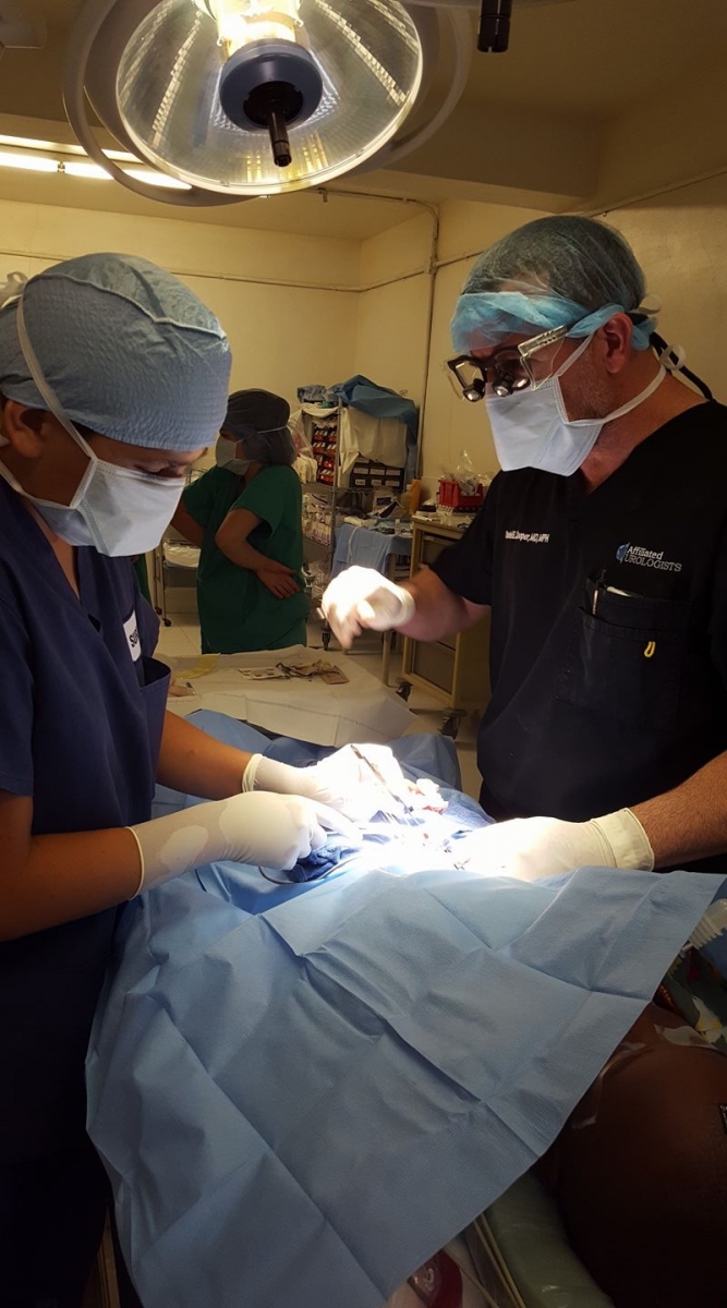 Dr. Cooper teaching OR volunteer in Haiti